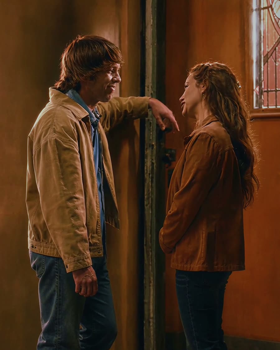 A couple at the front door on date night